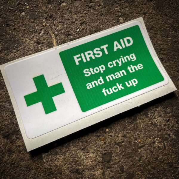 Funny "safety" sticker - FIRST AID: Stop crying and man the fuck up