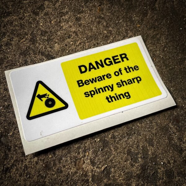 Funny "safety" sticker - DANGER: Beware of the spinny sharp thing